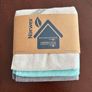 Norwex Body and Face Pack. Aqua, gray and cream.